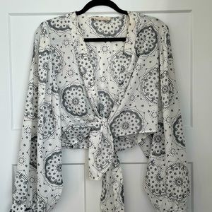 Blouse with cuffed sleeves